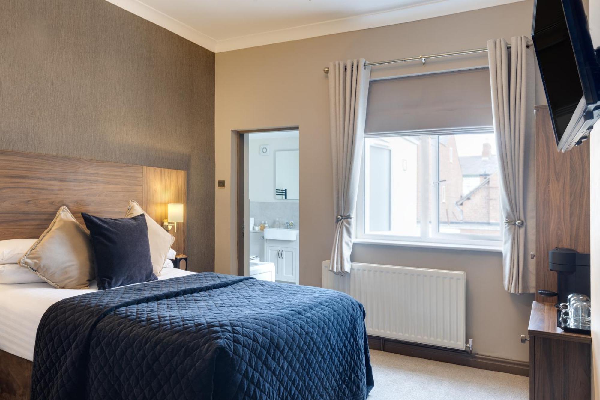 Stone Villa Chester Quarto foto A bedroom at the hotel